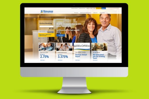 UFCU website homepage displayed on iMac